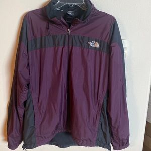 EUC The North Face windbreaker with hide-away hood. Purple/black, womens size XL